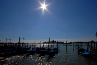 Gondolas waiting under the Venice Sun